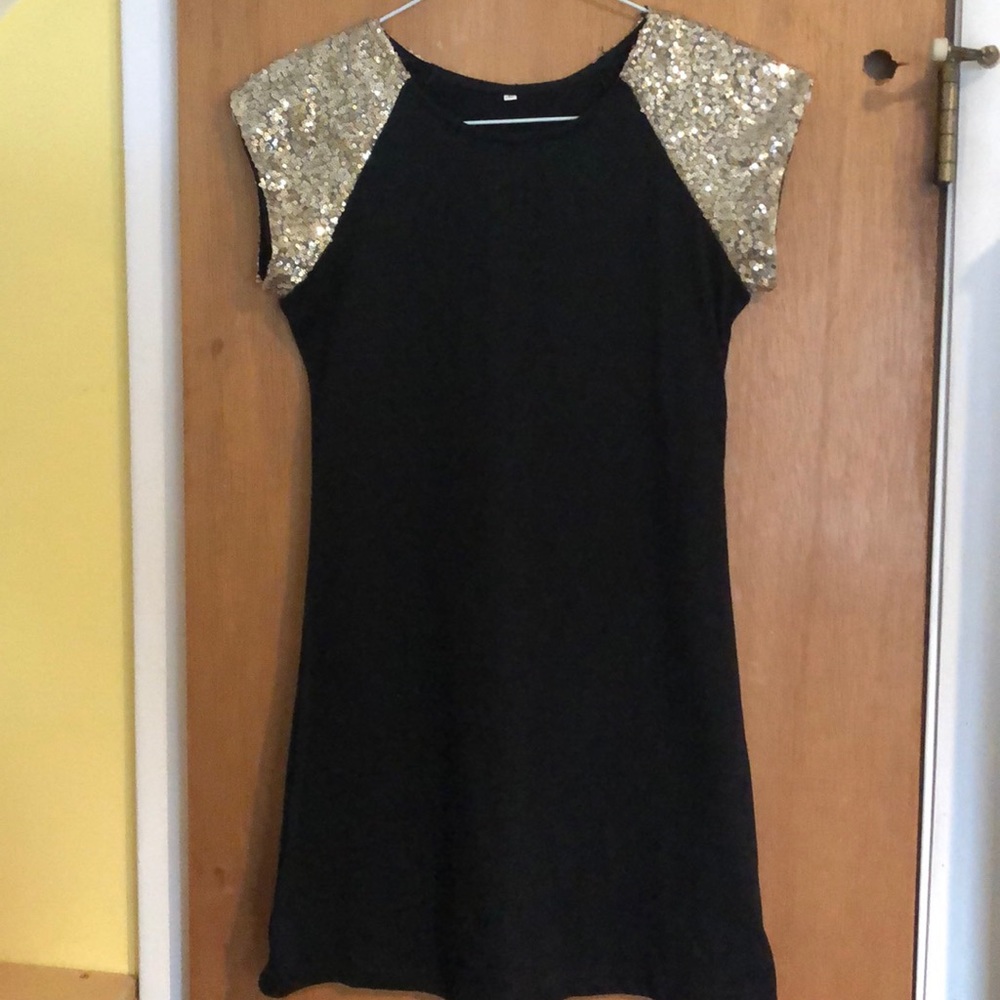 black cotton dress with sequence shoulders